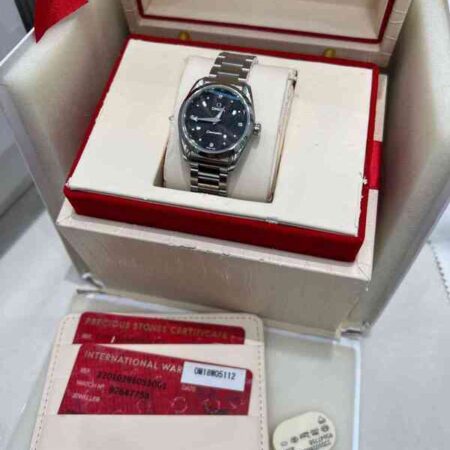 12102 - Omega - 220.10.28.60.51.001 - pre-owned conditions with MINOR signs of usage - Card & Box
