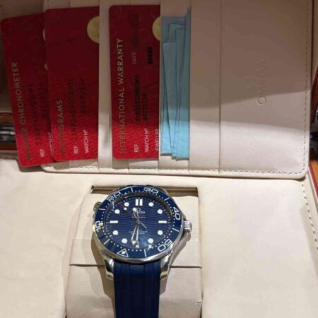 11705 - Omega - 210.32.42.20.03.001 - pre-owned conditions with MINOR signs of usage - Card & Box
