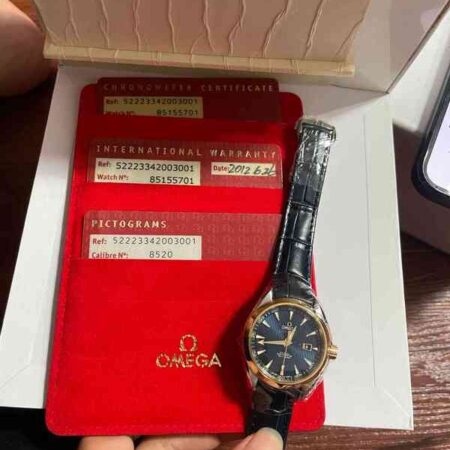 12190 - Omega - 522.23.34.20.03.001 - pre-owned conditions with MINOR signs of usage - Card & Box