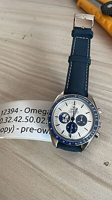 1239401-PRD - Omega 310.32.42.50.02.001 (Snoopy)