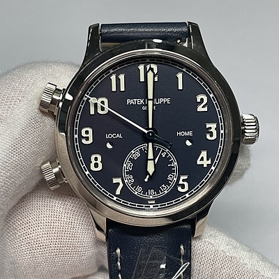 13683 - Patek Philippe - 7234G-001 - pre-owned conditions with MINOR signs of usage - Card & Box