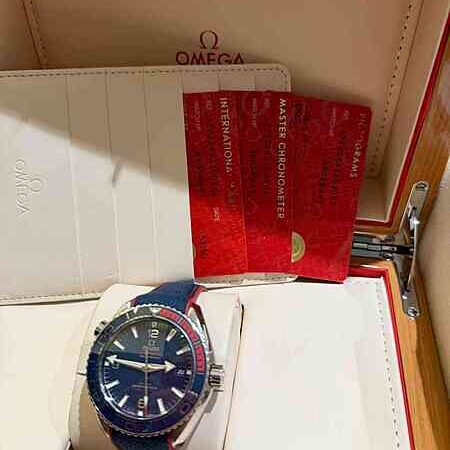 13972 - Omega - 522.32.44.21.03.001 - pre-owned conditions with MINOR signs of usage - Card & Box