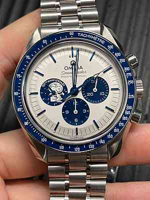 14643 - Omega - 310.32.42.50.02.001 (Snoopy, bracelet + Strap) - pre-owned conditions with MINOR signs of usage - Card & Box